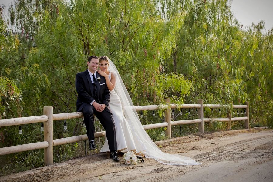 A couple in the vineyard rows