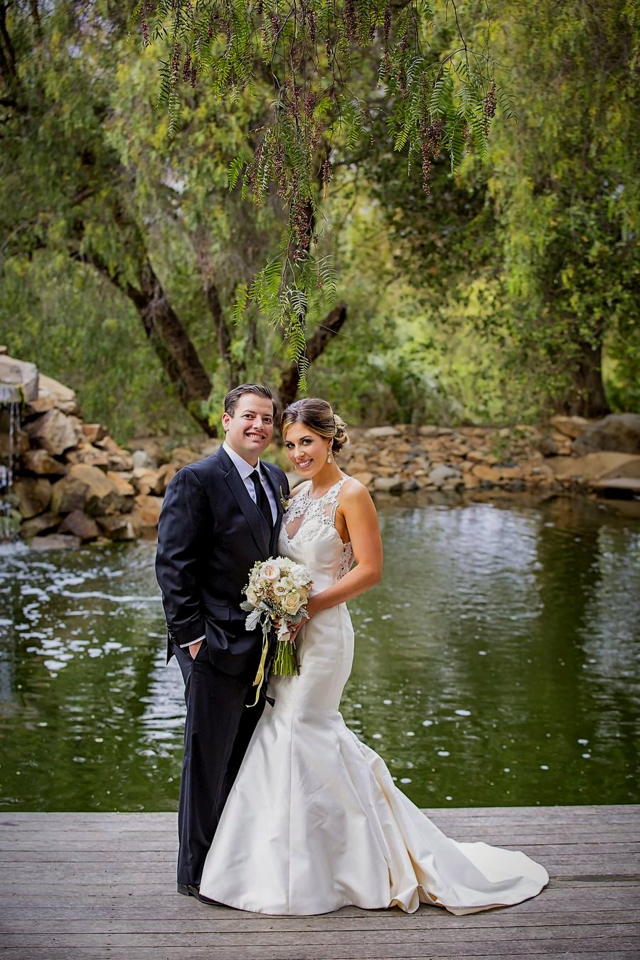 A couple at the vineyard pond