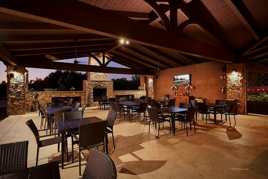 The covered Hill Top patio set for a private gathering