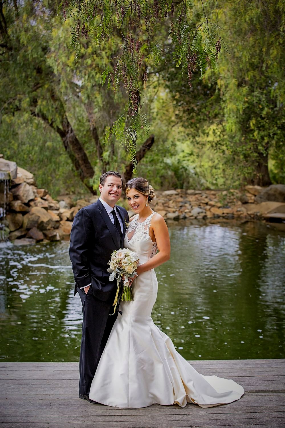 A couple at the vineyard pond